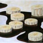 Das Bild zeigt Bananen mit Schokolade